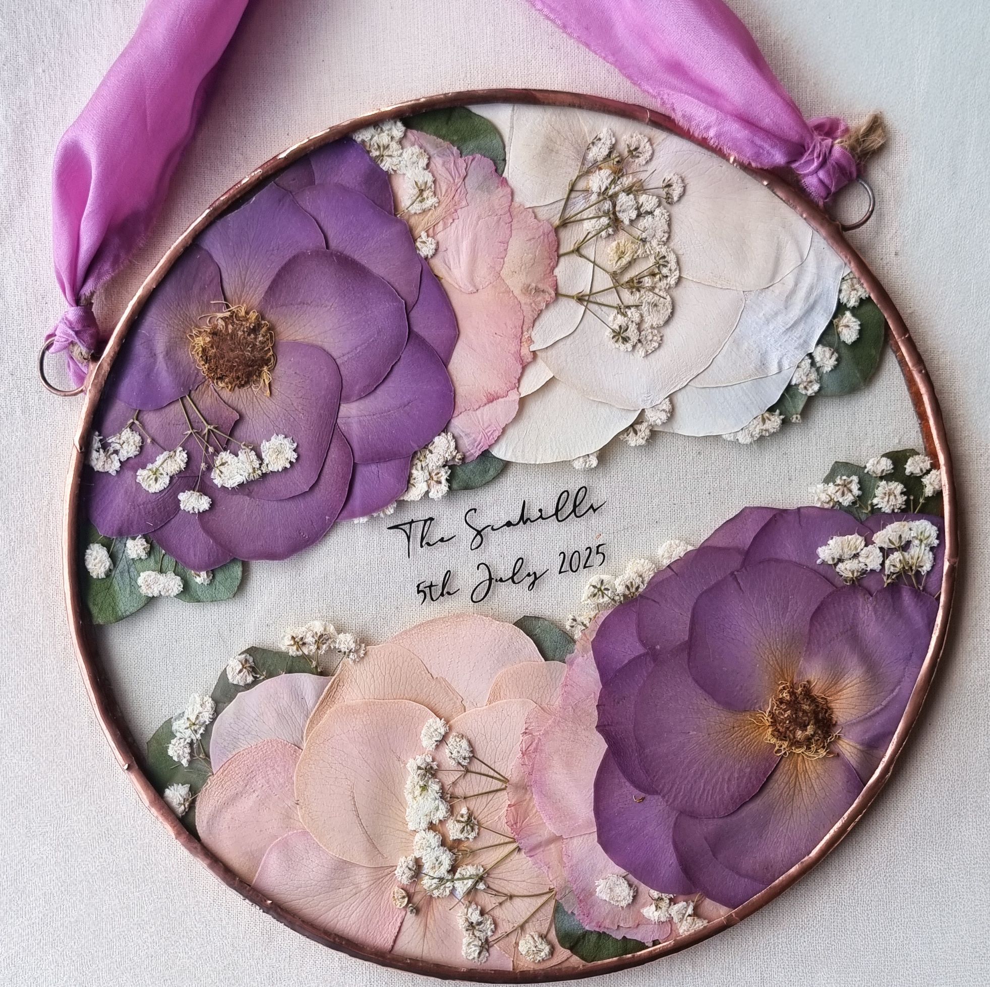 The Partial wedding bouquet and flower preservation frame.